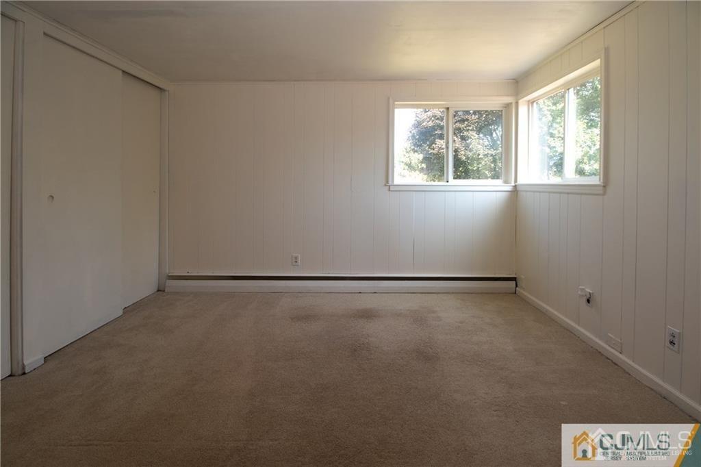 27 Eardley Road Edison, NJ 08817 - Photo 7 of 14 a view of a window in an empty room