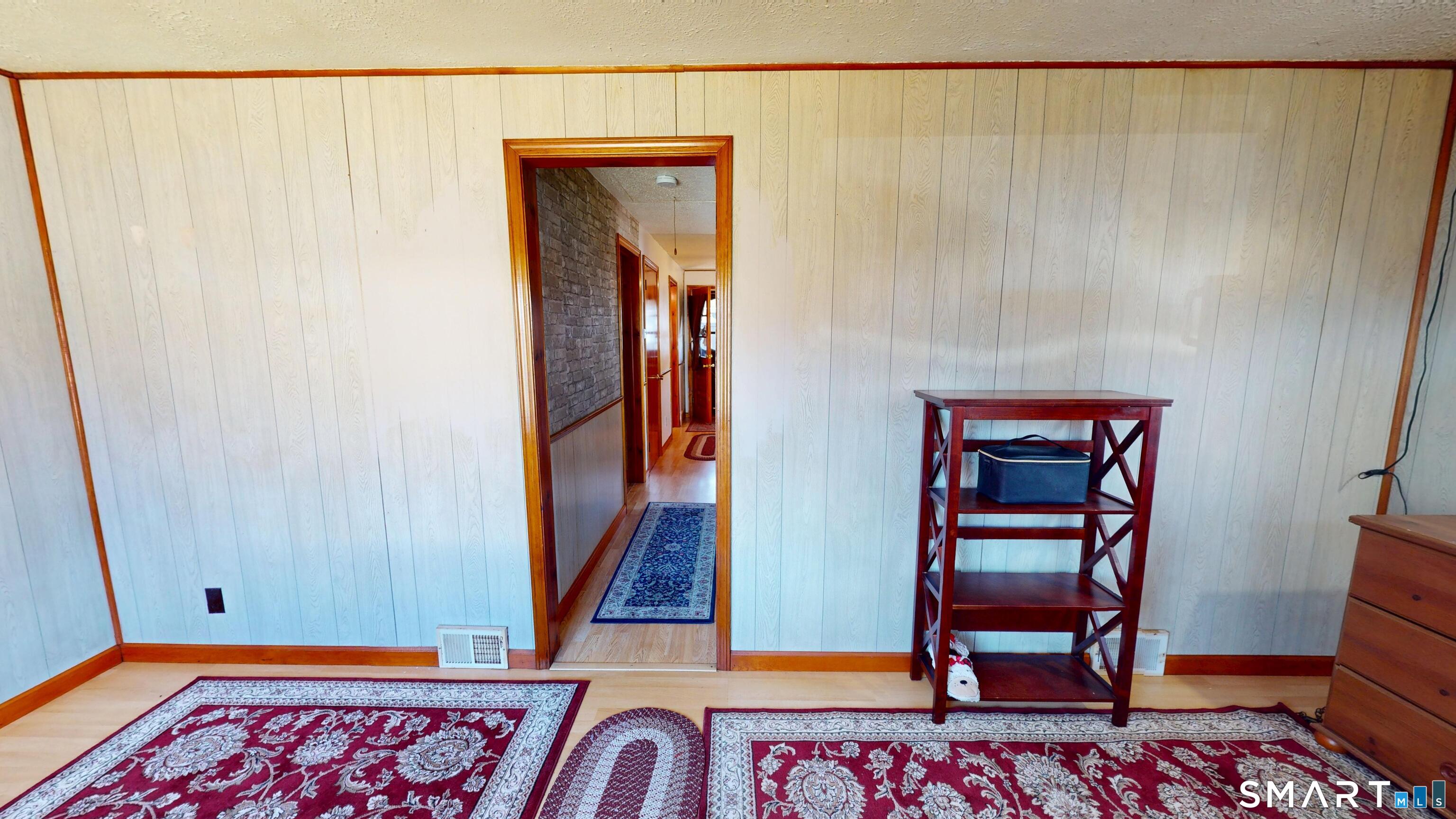 137 Brook Street Bristol, CT 06010 - Photo 27 of 37 a view of an entryway with bench