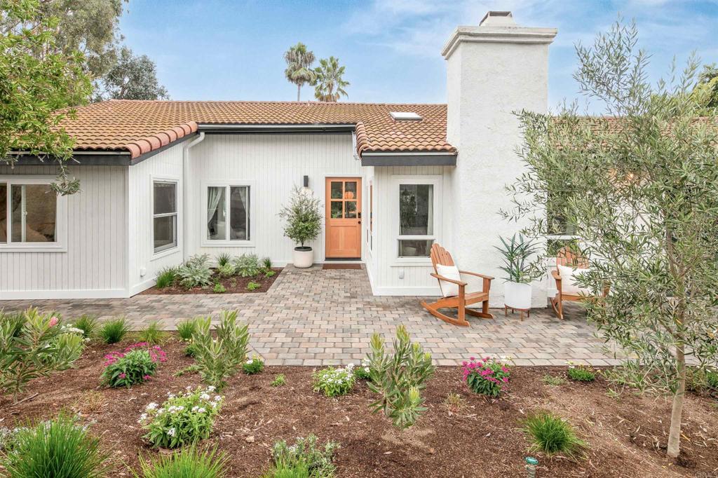 1427 Avocado Road Oceanside, CA 92054 - Photo 2 of 60 a front view of a house with a yard