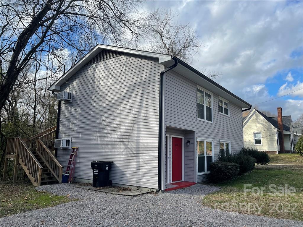 270 Spring Street Southwest Concord, NC 28025 - Photo 2 of 8 a view of a house with a yard