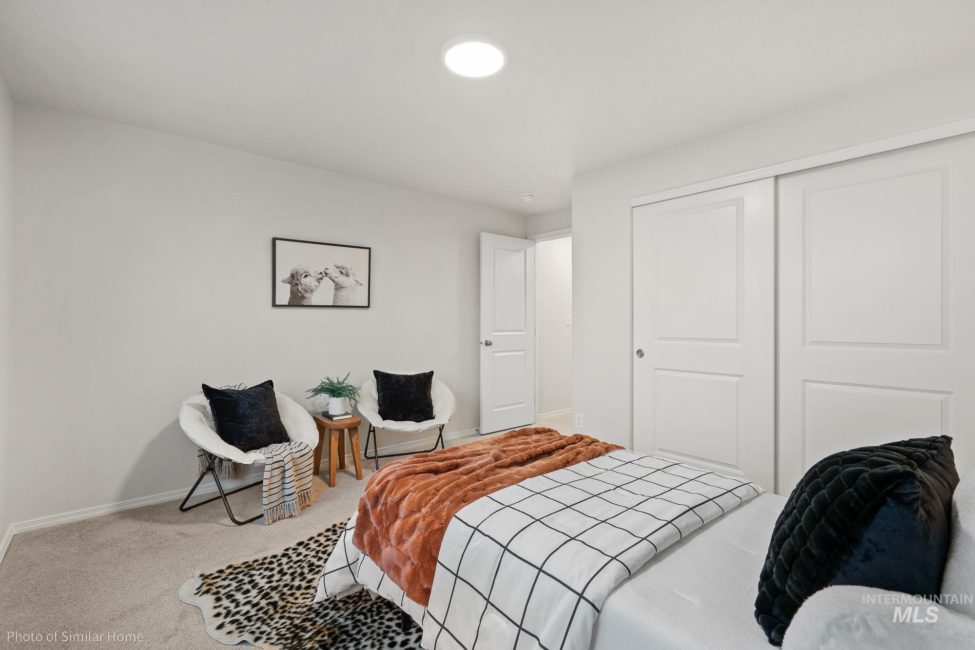 877 West Roan Ridge Nampa, ID 83686 - Photo 13 of 13 Carpeted bedroom featuring a closet and baseboards