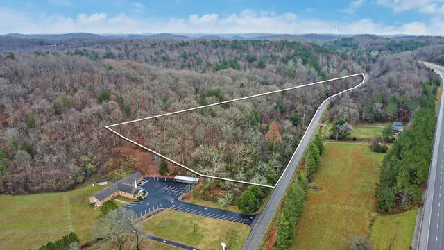 a view of a house with a swimming pool