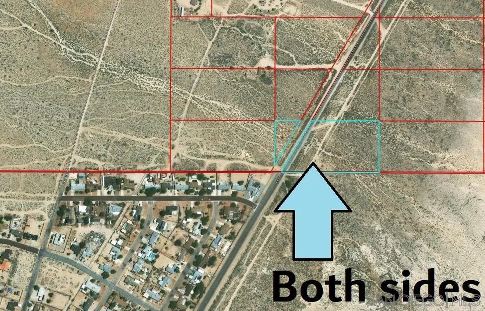 a picture of a tree in front of a house