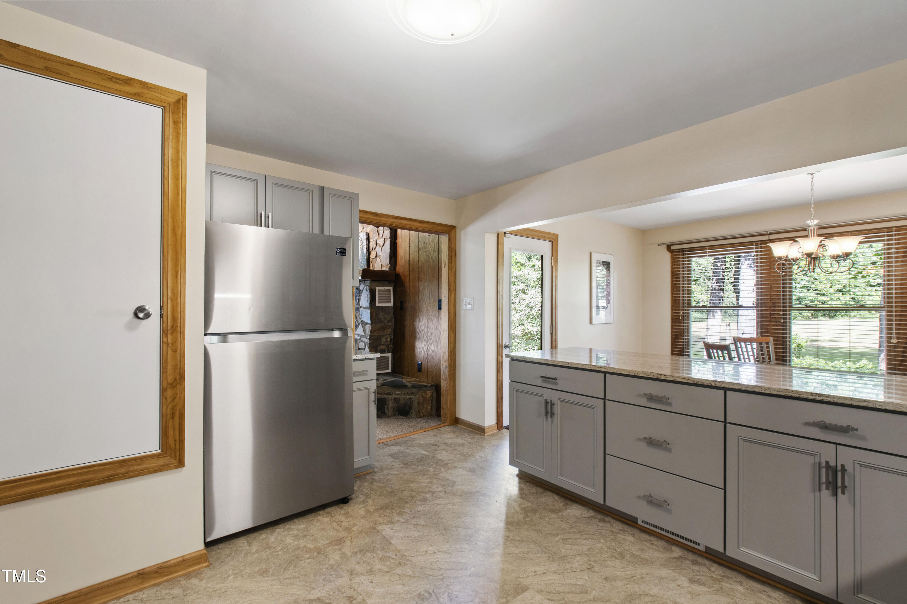 5415 Bradshaw Quarry Road Efland, NC 27243 - Photo 13 of 65 a kitchen with stainless steel appliances a refrigerator sink and cabinets