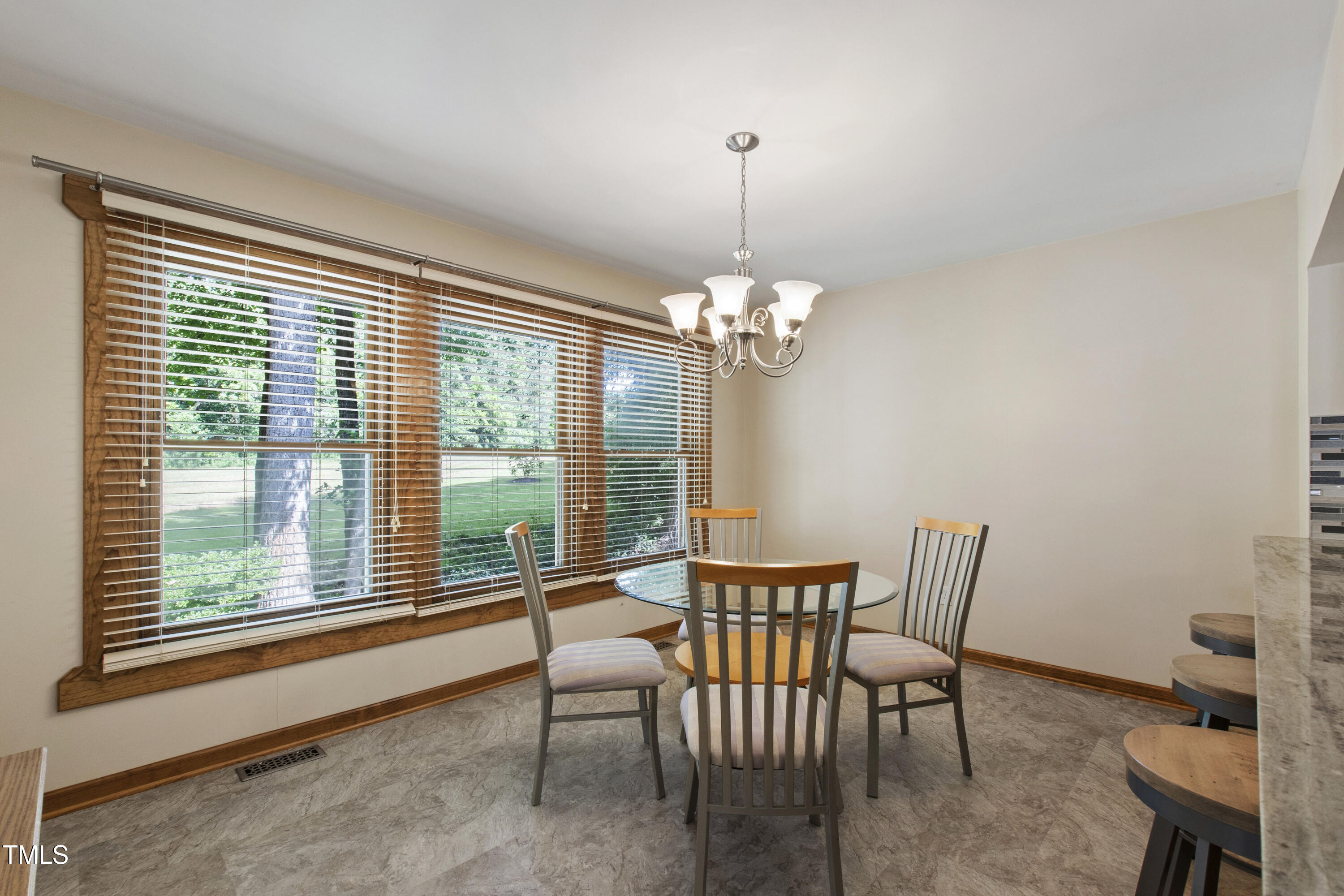5415 Bradshaw Quarry Road Efland, NC 27243 - Photo 17 of 65 a view of a dining room with furniture window and outside view