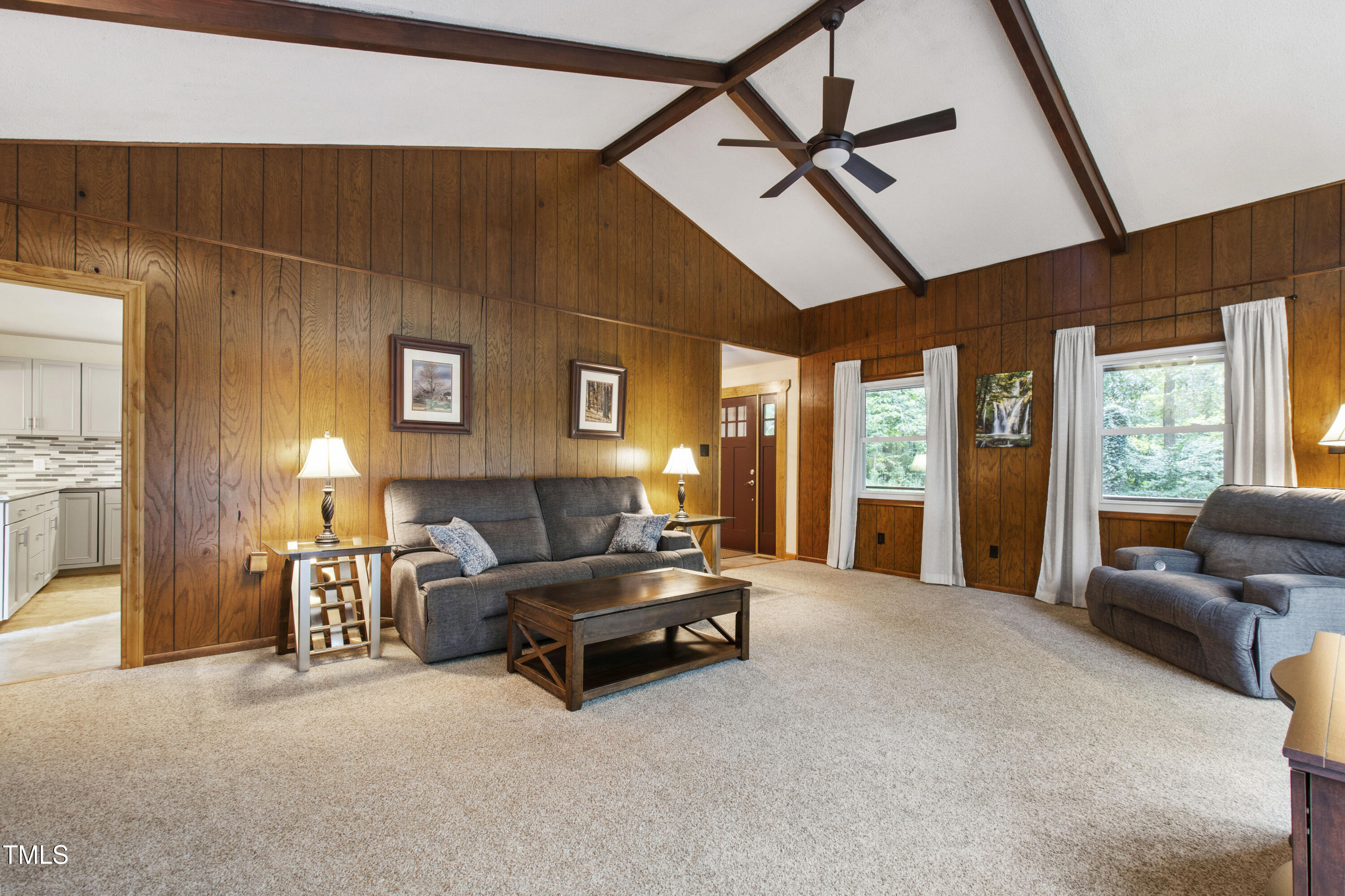 5415 Bradshaw Quarry Road Efland, NC 27243 - Photo 20 of 65 a living room with furniture and a flat screen tv