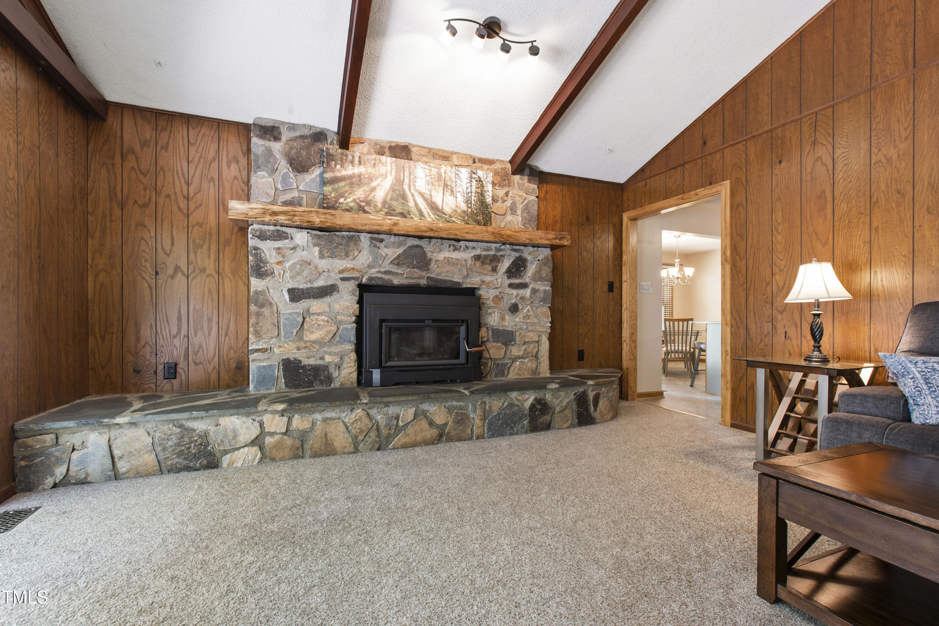 5415 Bradshaw Quarry Road Efland, NC 27243 - Photo 21 of 65 an empty room with fireplace and window