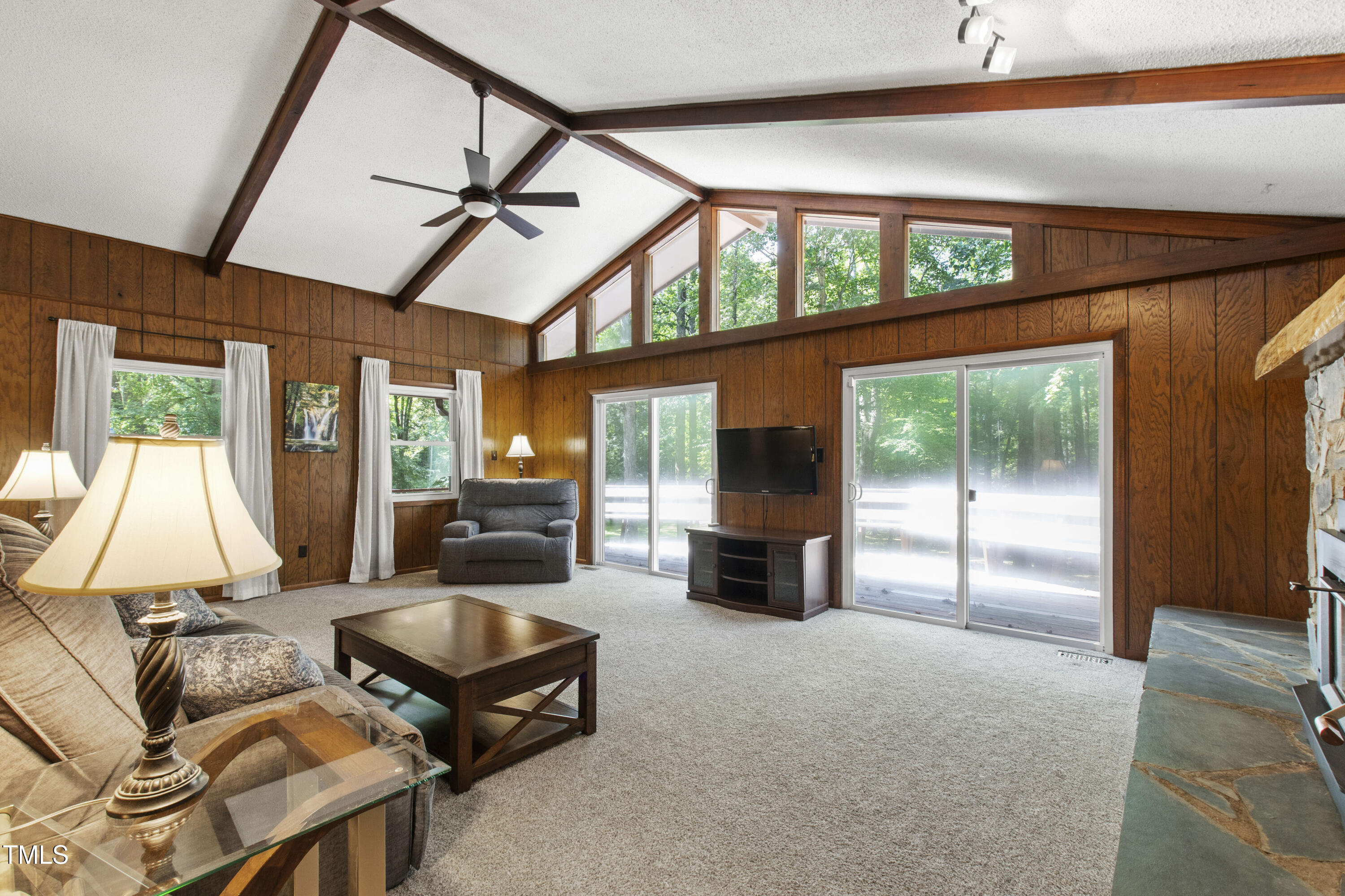 5415 Bradshaw Quarry Road Efland, NC 27243 - Photo 2 of 65 a living room with furniture and a fireplace