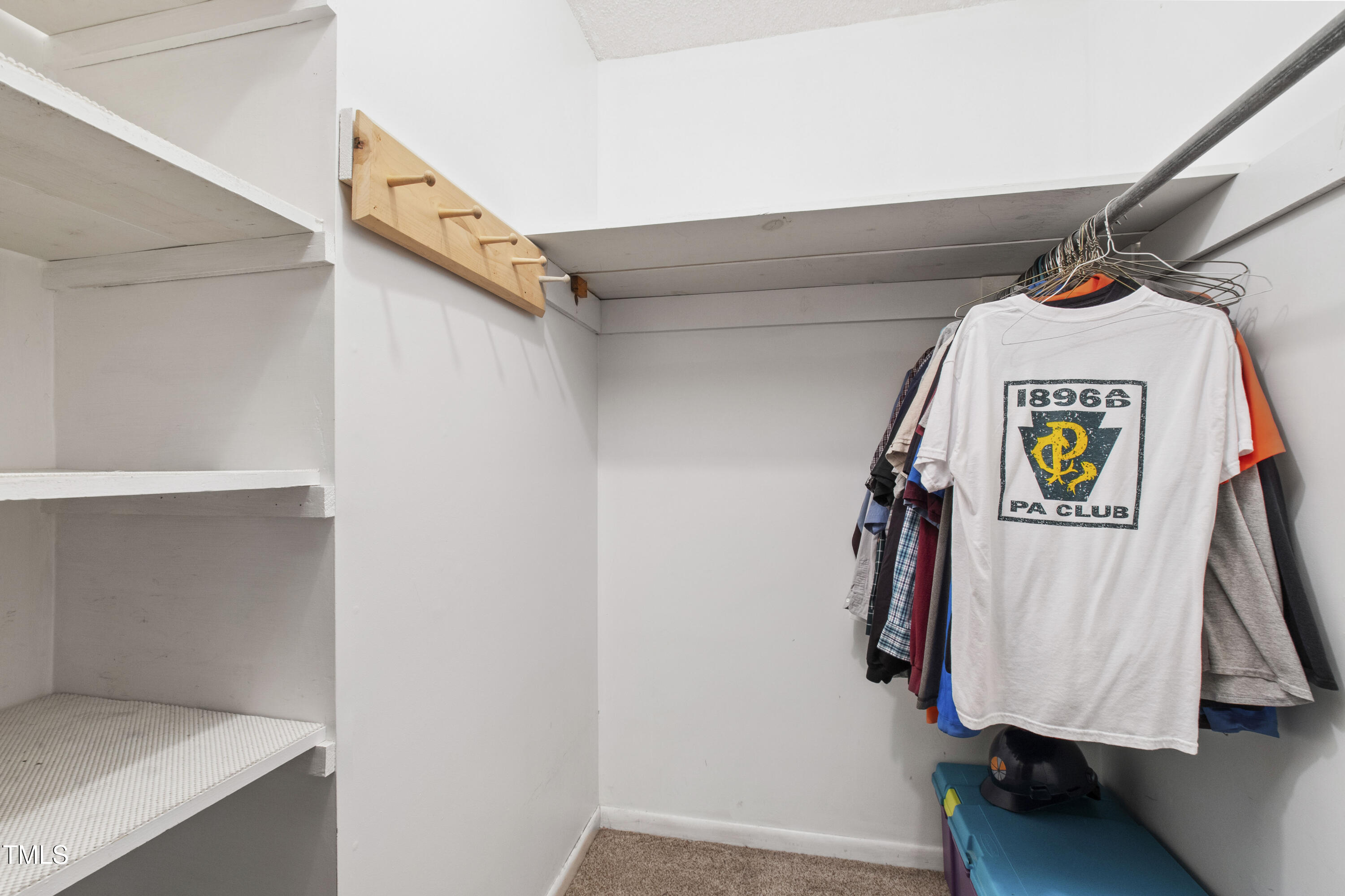5415 Bradshaw Quarry Road Efland, NC 27243 - Photo 30 of 65 a view of walk in closet with clothes and shoes