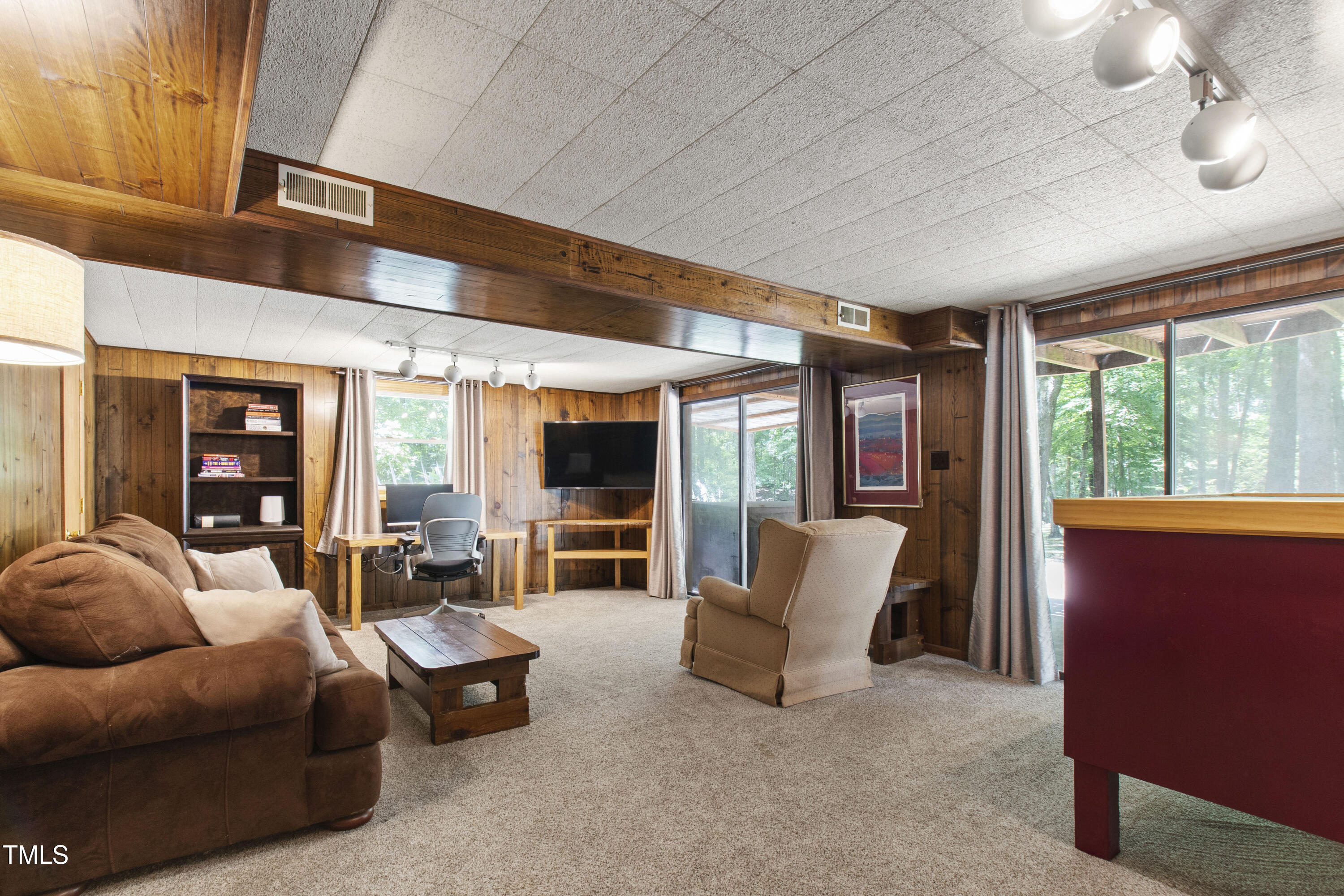5415 Bradshaw Quarry Road Efland, NC 27243 - Photo 33 of 65 a living room with furniture and large windows