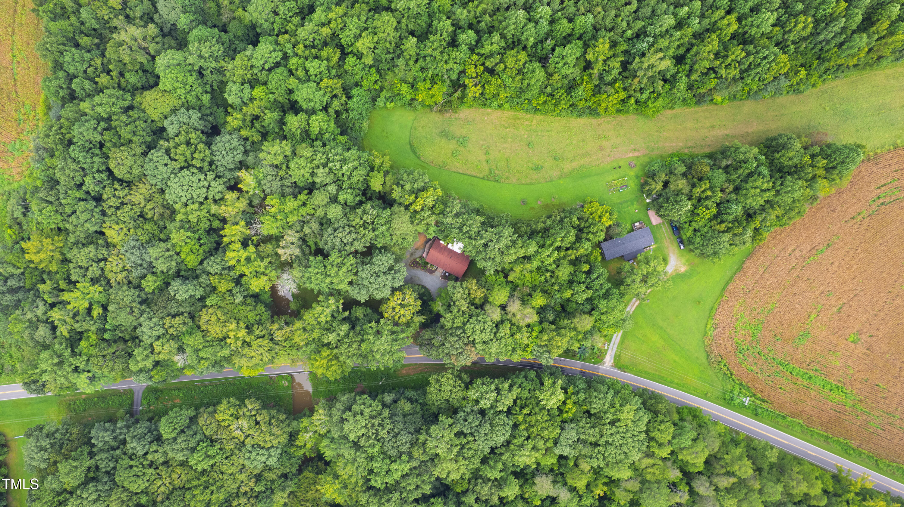 5415 Bradshaw Quarry Road Efland, NC 27243 - Photo 40 of 65 a view of a yard with plants