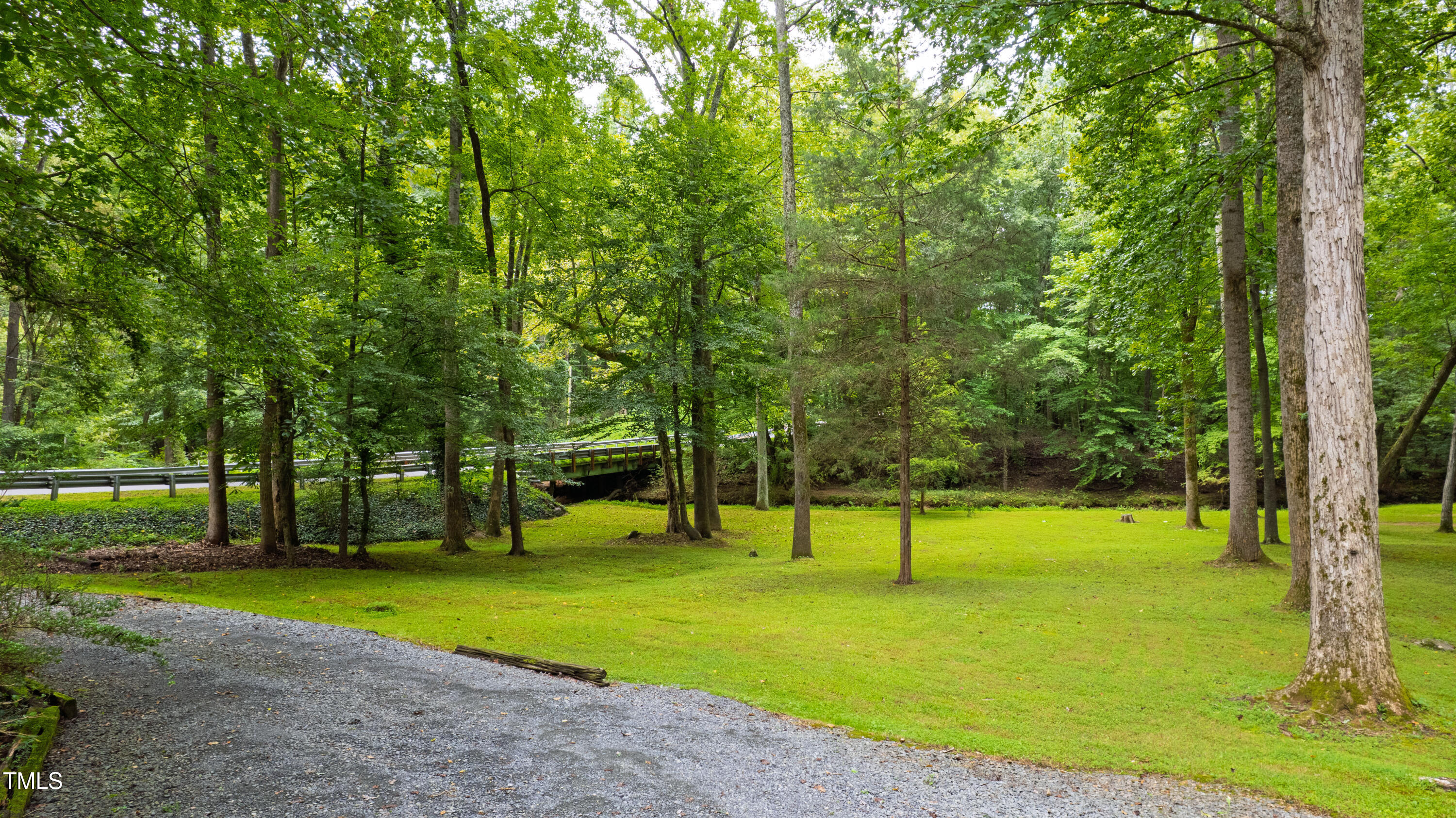 5415 Bradshaw Quarry Road Efland, NC 27243 - Photo 47 of 65 a view of a park with large trees