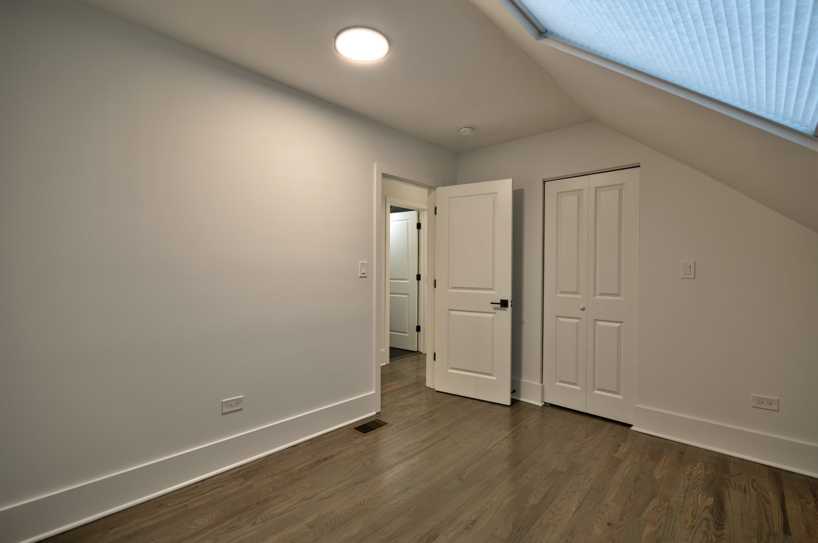 1917 South Racine Avenue, Unit 2F Chicago, IL 60608 - Photo 12 of 13 a view of an empty room and wooden floor