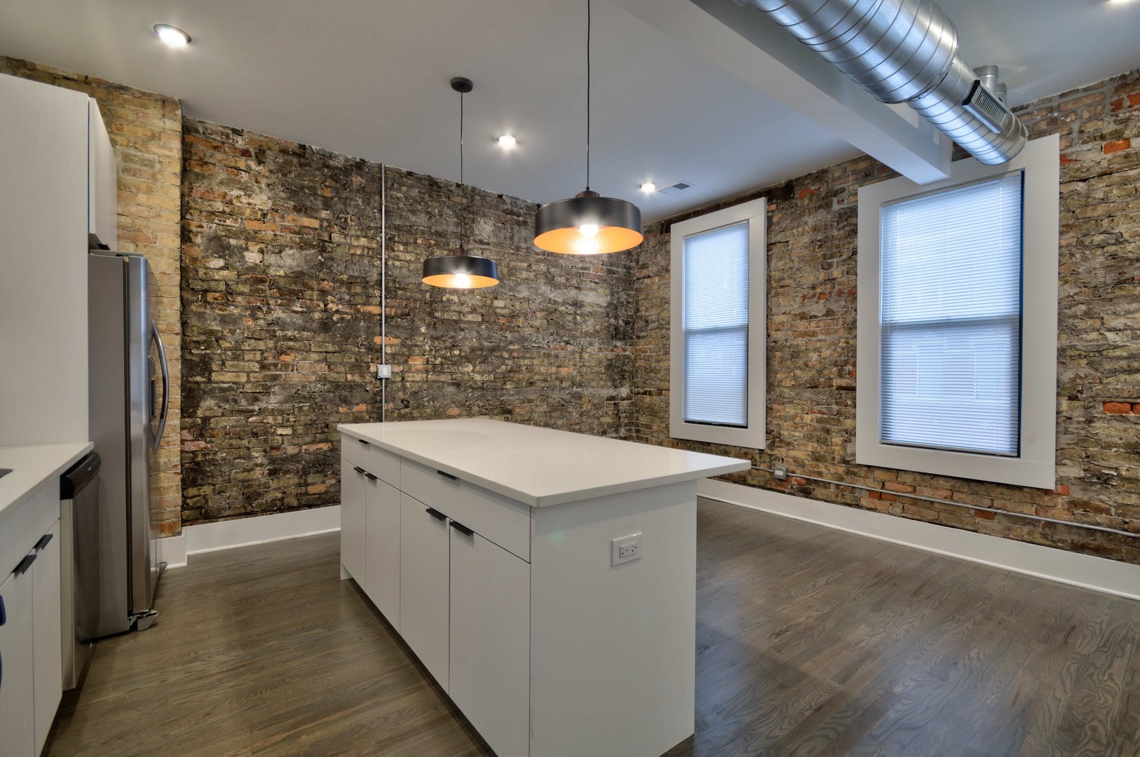 1917 South Racine Avenue, Unit 2F Chicago, IL 60608 - Photo 4 of 13 a bathroom with a sink and a mirror