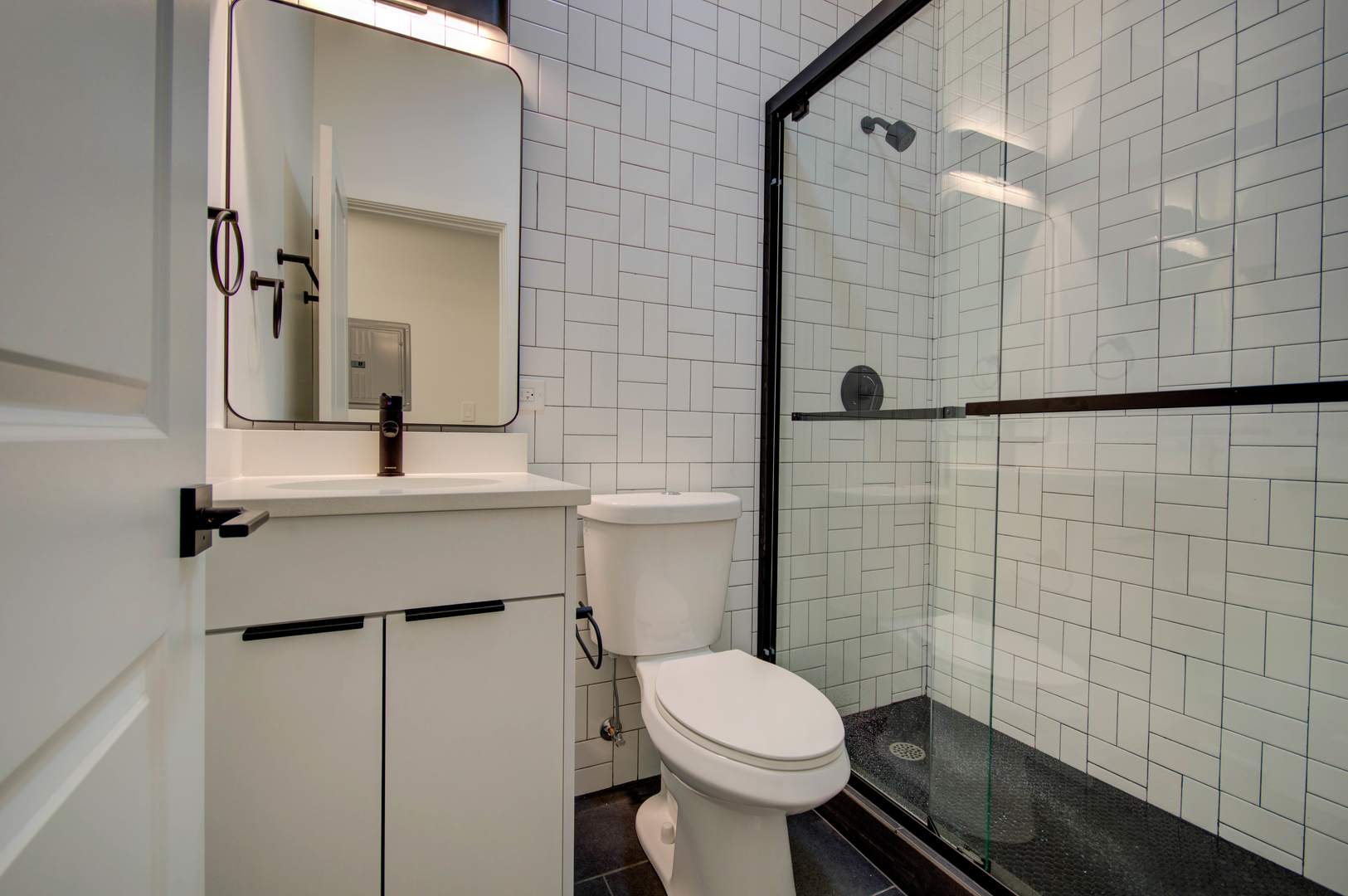 1917 South Racine Avenue, Unit 2F Chicago, IL 60608 - Photo 7 of 13 a bathroom with a toilet and a shower