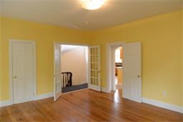 71 Fordham Road, Unit 71 Newton, MA 02465 - Photo 6 of 15 a view of a room with wooden floor and bathroom