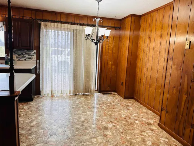 a view of a bathroom with a shower and a tub