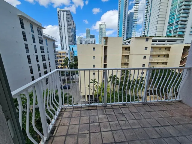 a view of balcony with outdoor seating