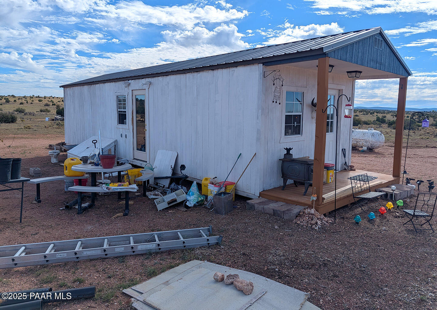 0 West Via Dolorosa Road Seligman, AZ 86337 - Photo 22 of 39 a backyard of a house with outdoor seating