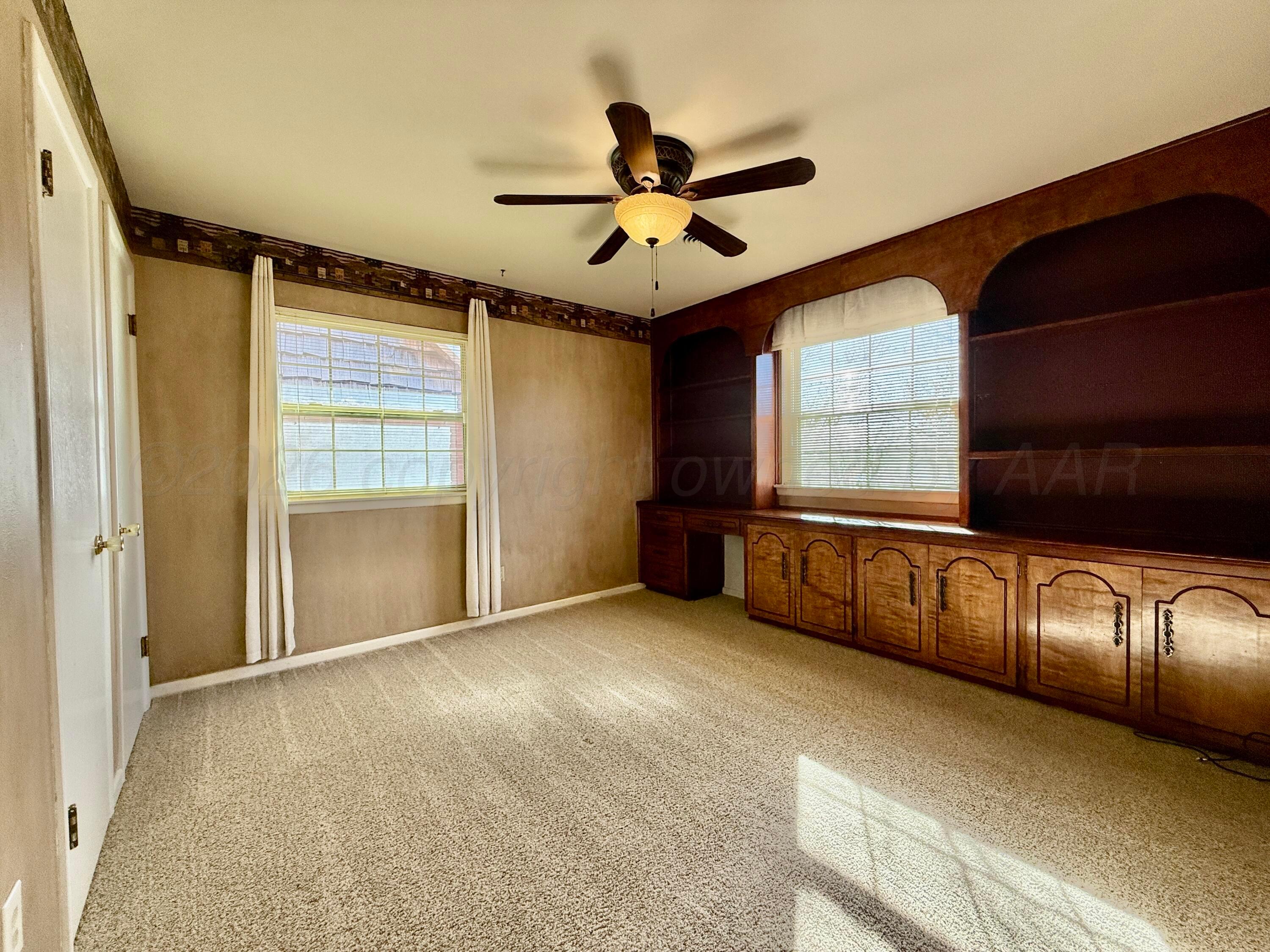 1509 Pellinore Street Borger, TX 79007 - Photo 15 of 22 a view of an empty room with a window