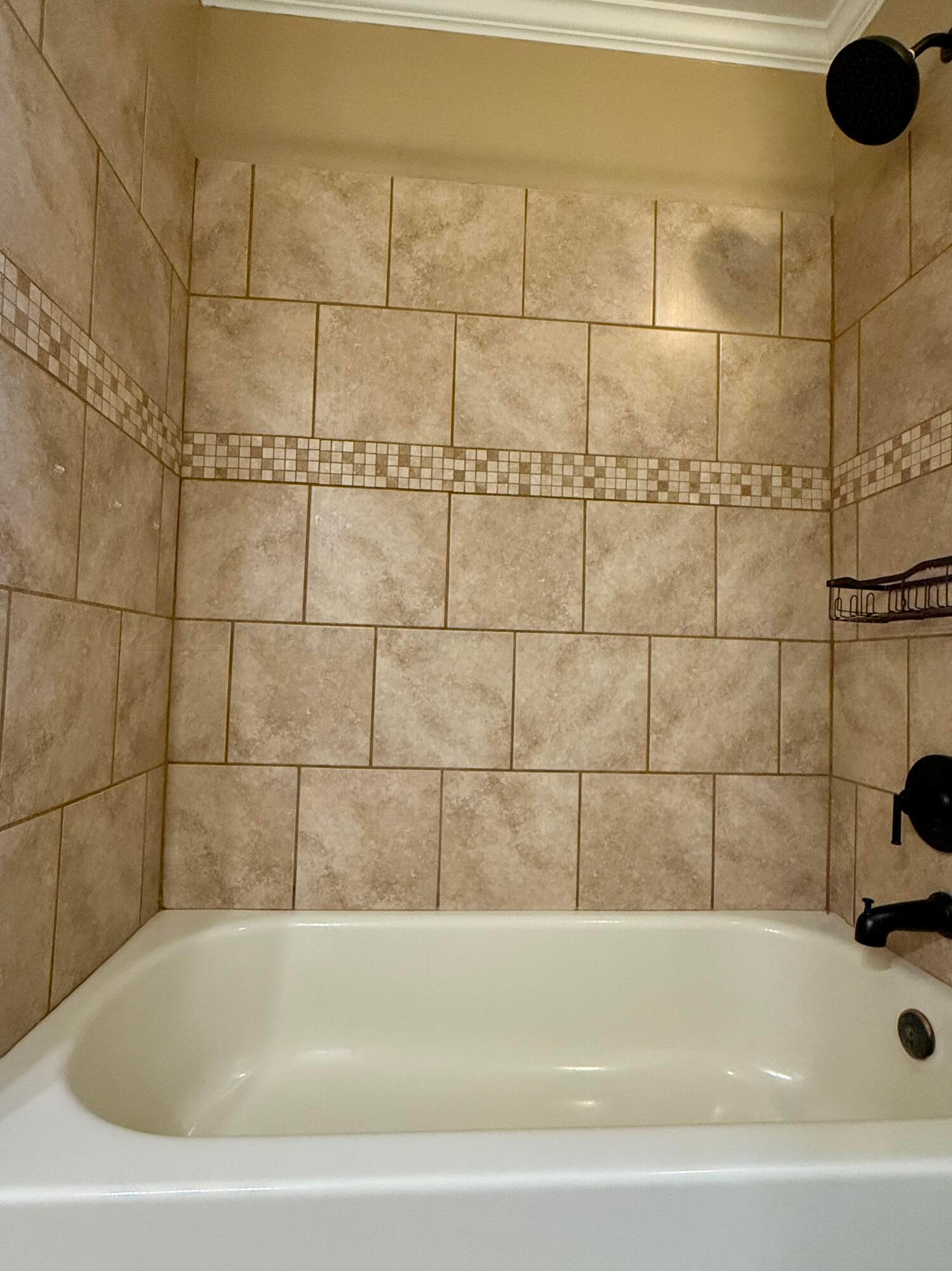 1509 Pellinore Street Borger, TX 79007 - Photo 17 of 22 a bathroom with a bathtub