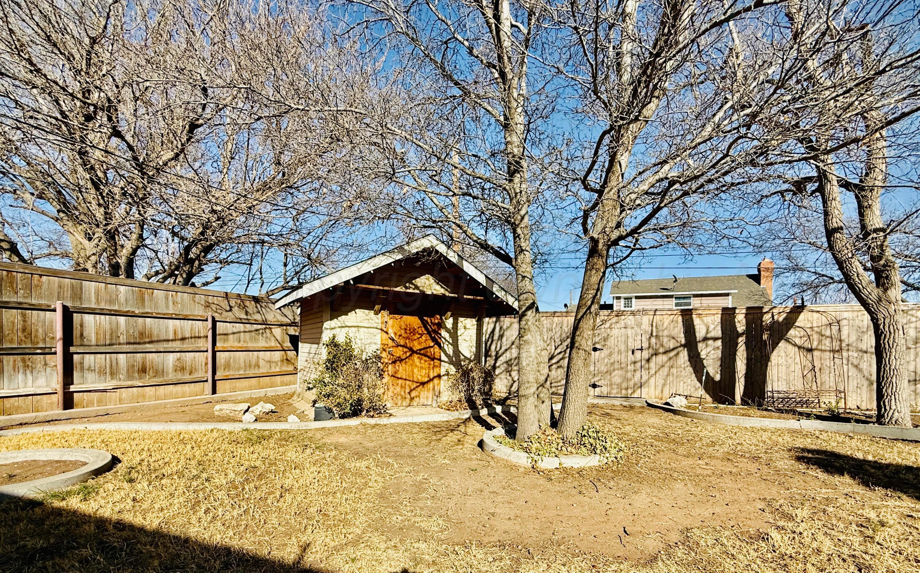 1509 Pellinore Street Borger, TX 79007 - Photo 21 of 22 a view of a yard covered with snow in front of house