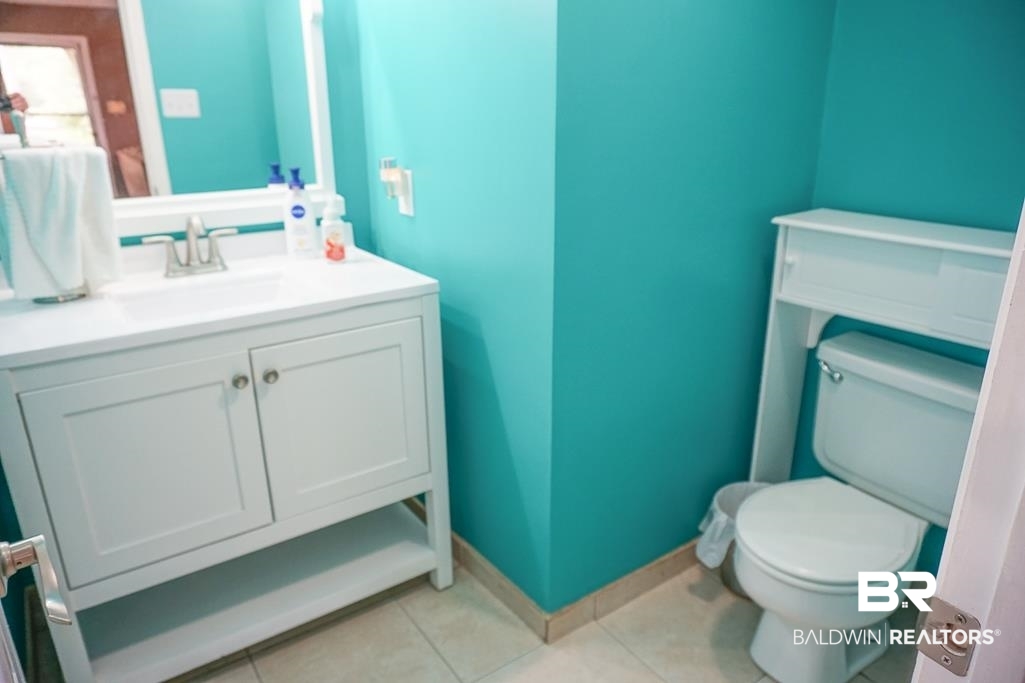 254 Thrift Street Mobile, AL 36609 - Photo 10 of 16 Bathroom featuring tile patterned floors and vanity