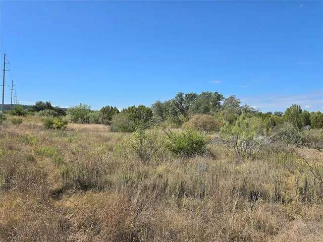 a view of lake with green space