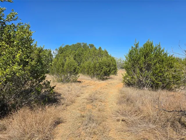 a view of mountain with lake view