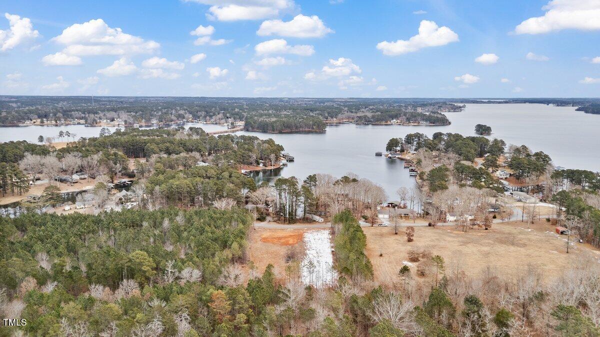 a view of a lake with a city