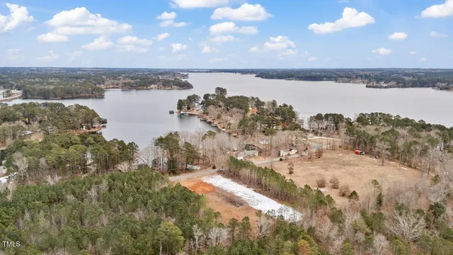 a view of a yard covered in snow