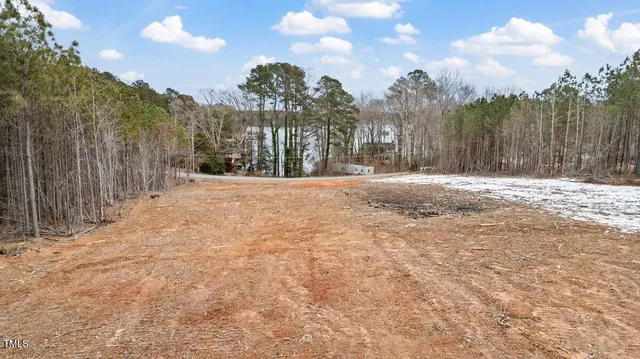 a view of a backyard of the house
