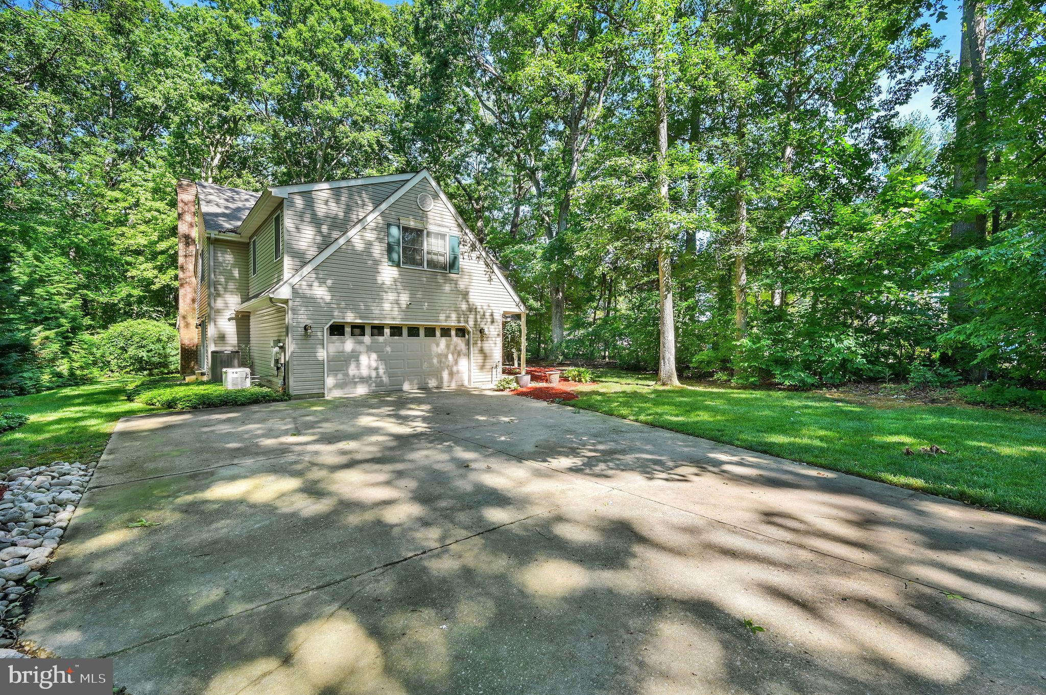 176 Burning Tree Road Dover, DE 19904 - Photo 2 of 33 Charming home nestled in lush greenery.