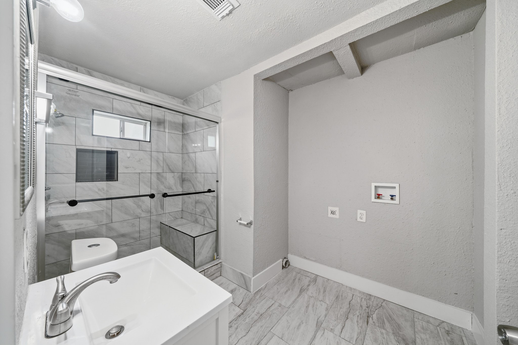 1718 Miami Road Pasadena, TX 77502 - Photo 6 of 11 a bathroom with a sink toilet and shower