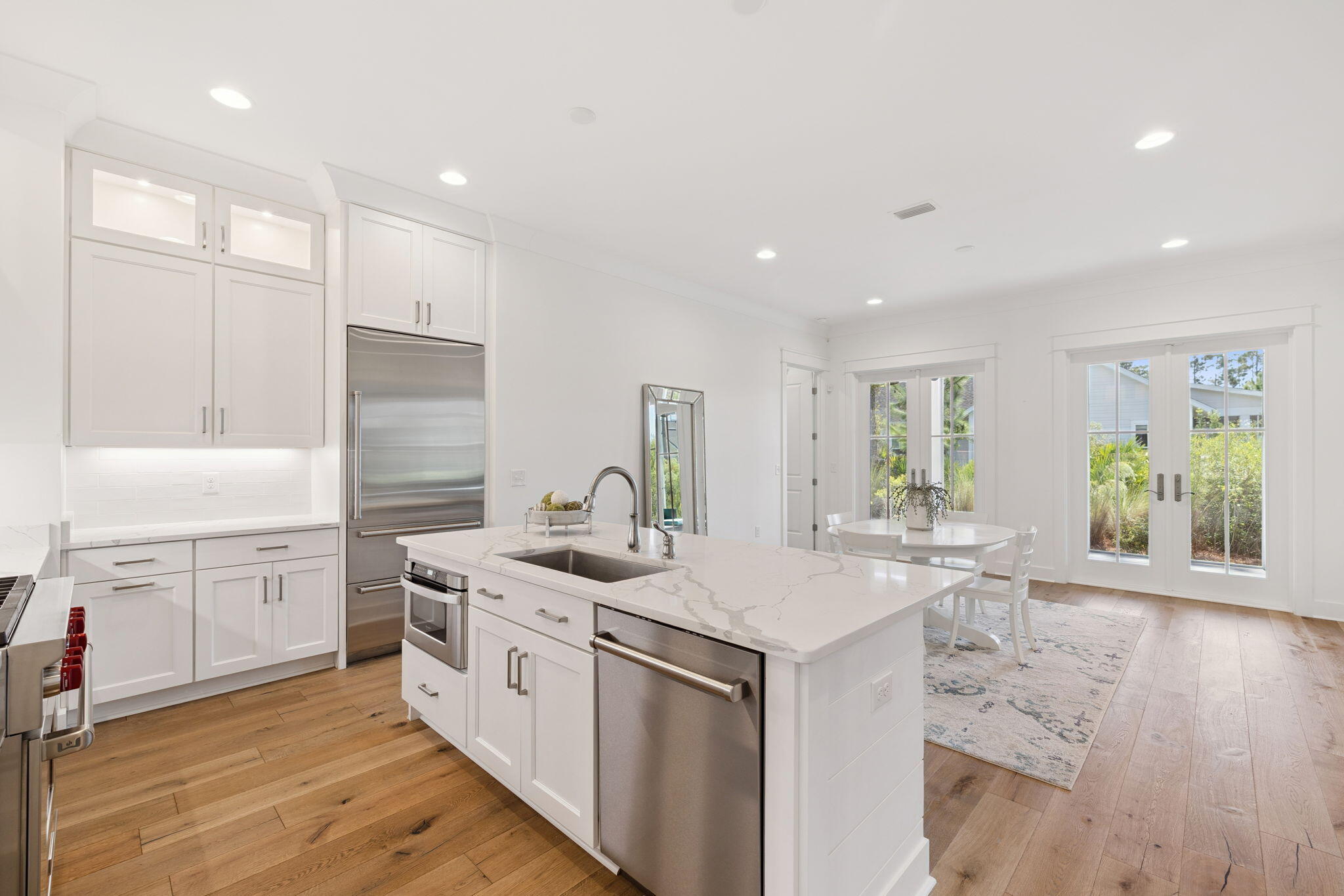 184 Trailhead Drive Inlet Beach, FL 32461 - Photo 15 of 49 a kitchen with a sink stove and cabinets