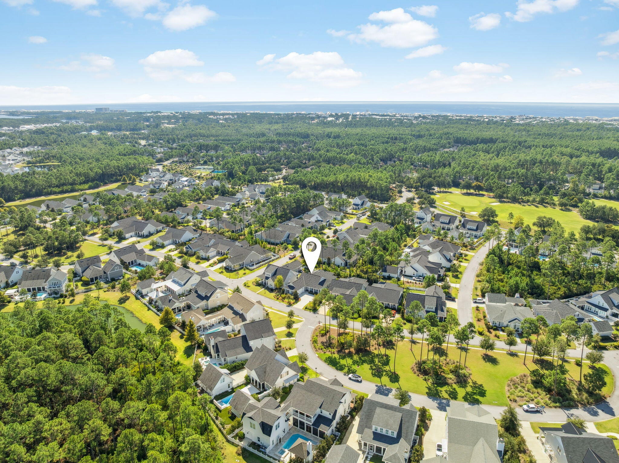 184 Trailhead Drive Inlet Beach, FL 32461 - Photo 2 of 49 a view of a city with lush green forest
