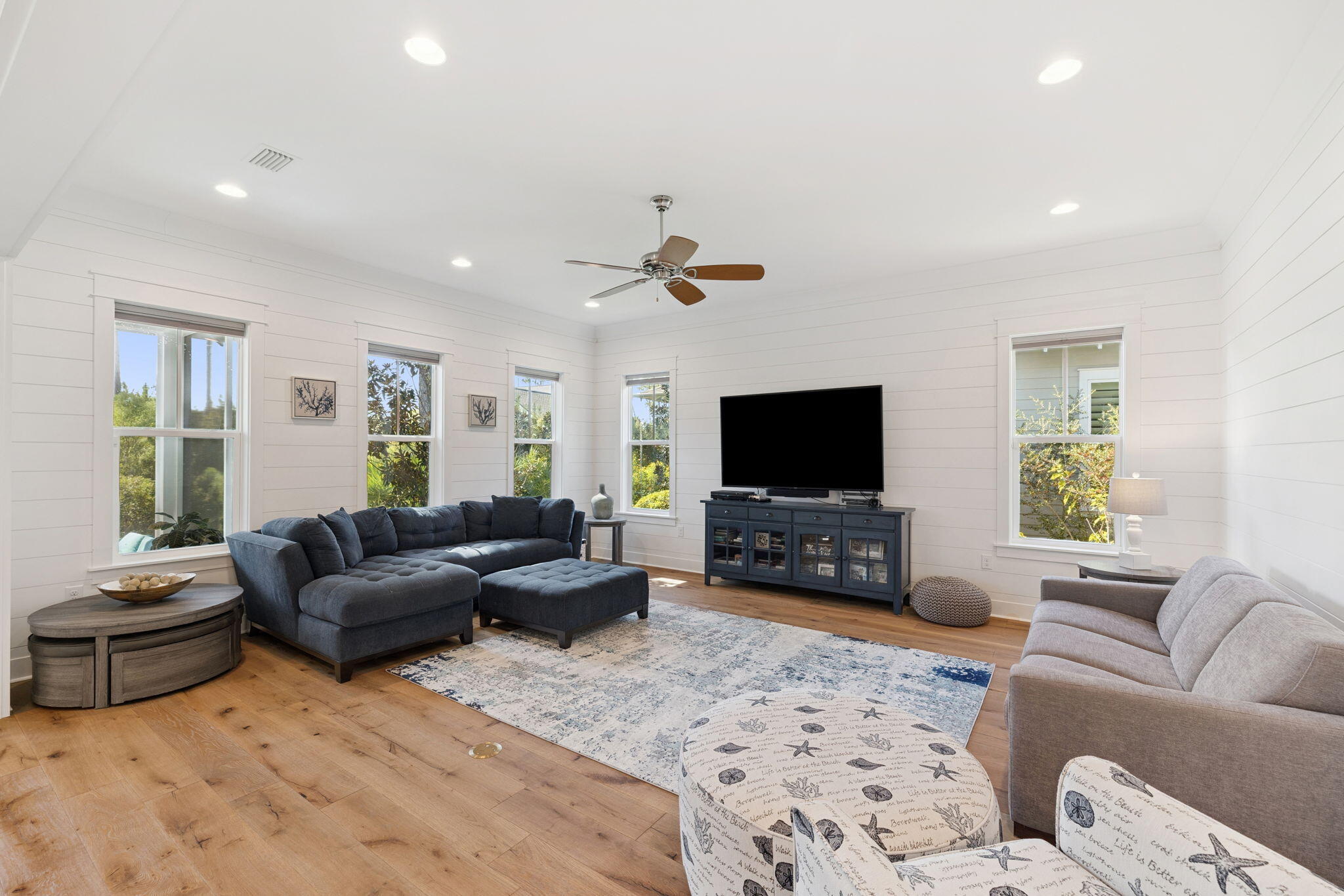 184 Trailhead Drive Inlet Beach, FL 32461 - Photo 23 of 49 a living room with furniture or couch and a flat screen tv
