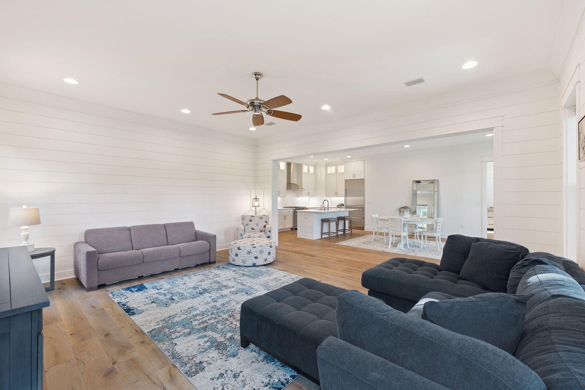 184 Trailhead Drive Inlet Beach, FL 32461 - Photo 24 of 49 a living room with furniture kitchen view and a couch