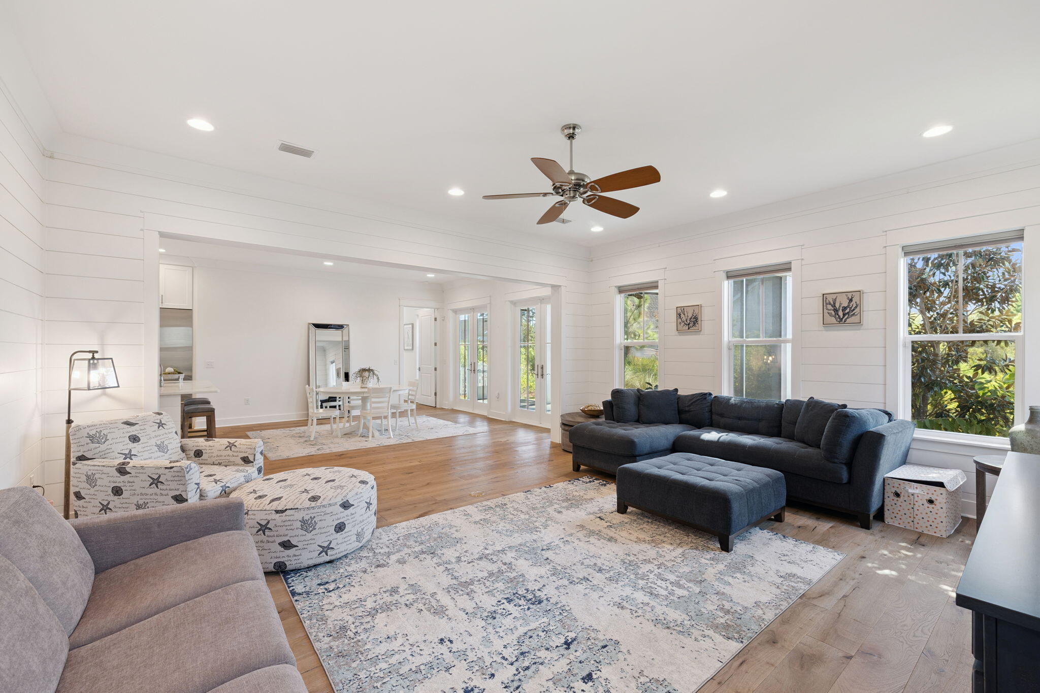 184 Trailhead Drive Inlet Beach, FL 32461 - Photo 25 of 49 a living room with furniture and a large window