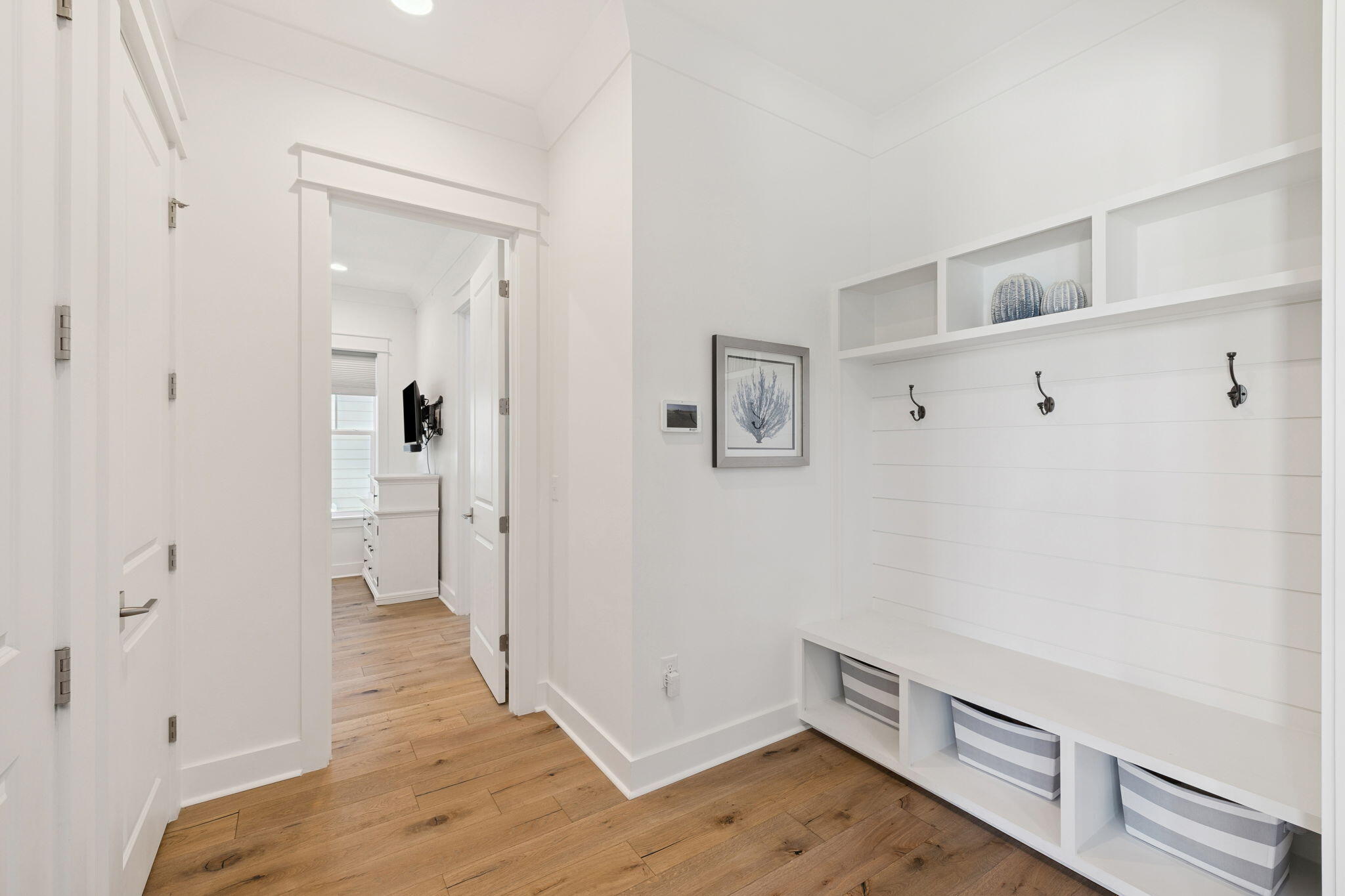 184 Trailhead Drive Inlet Beach, FL 32461 - Photo 27 of 49 a view of a hallway with wooden floor and closet