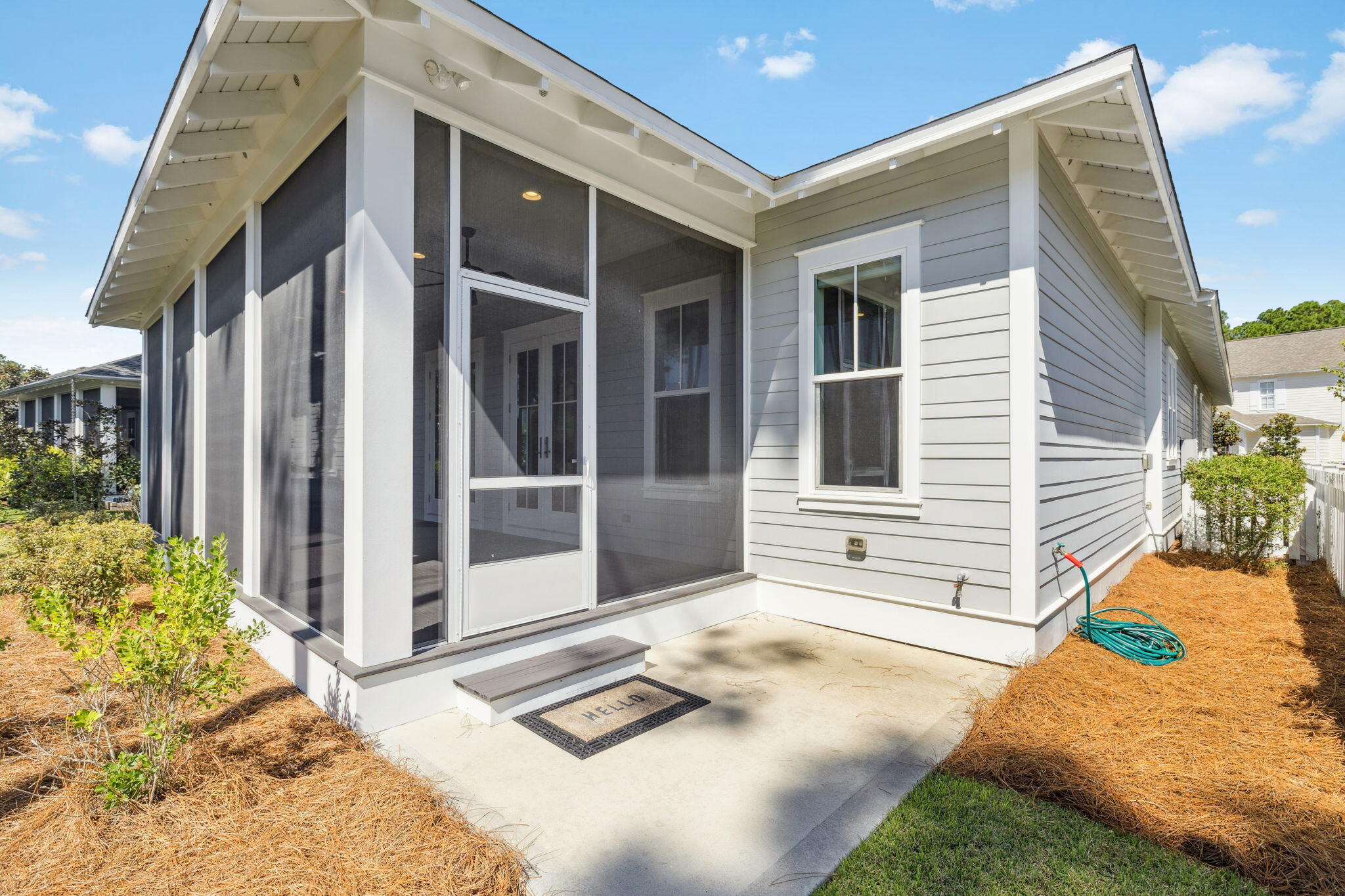 184 Trailhead Drive Inlet Beach, FL 32461 - Photo 9 of 49 a front view of a house with a garden