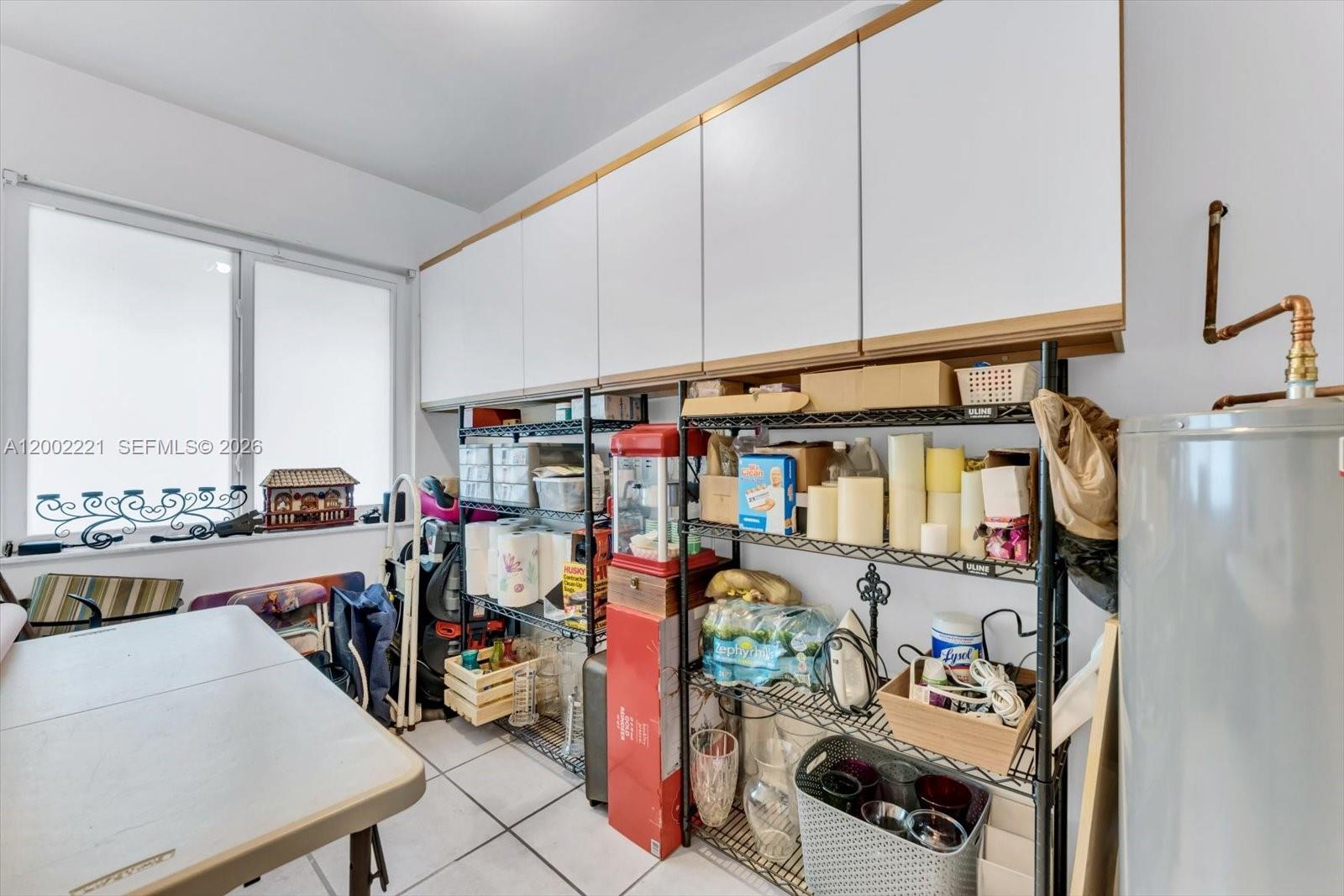 9941 Southwest 143rd Street Miami, FL 33176 - Photo 28 of 48 Perfect storage/utility room under A/C