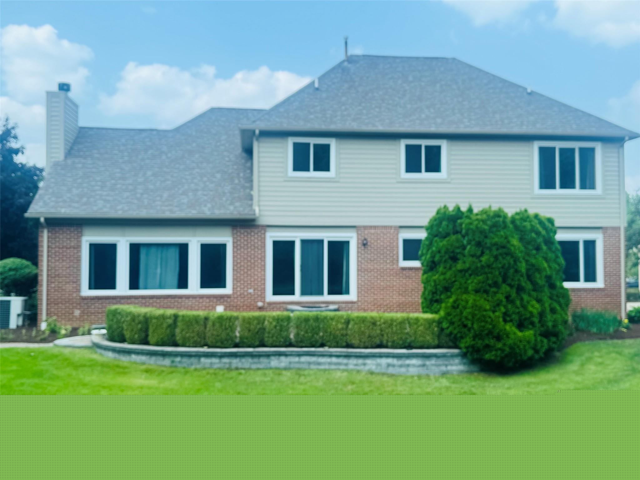 171 Millstone Road Troy, MI 48084 - Photo 37 of 43 Back of the house is overlocking the nature