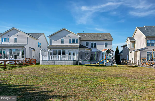 front view of a building with a yard