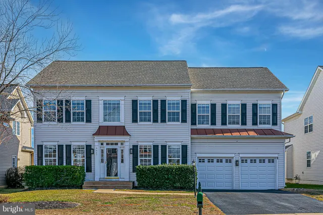 a picture of a room with a white wall and a window