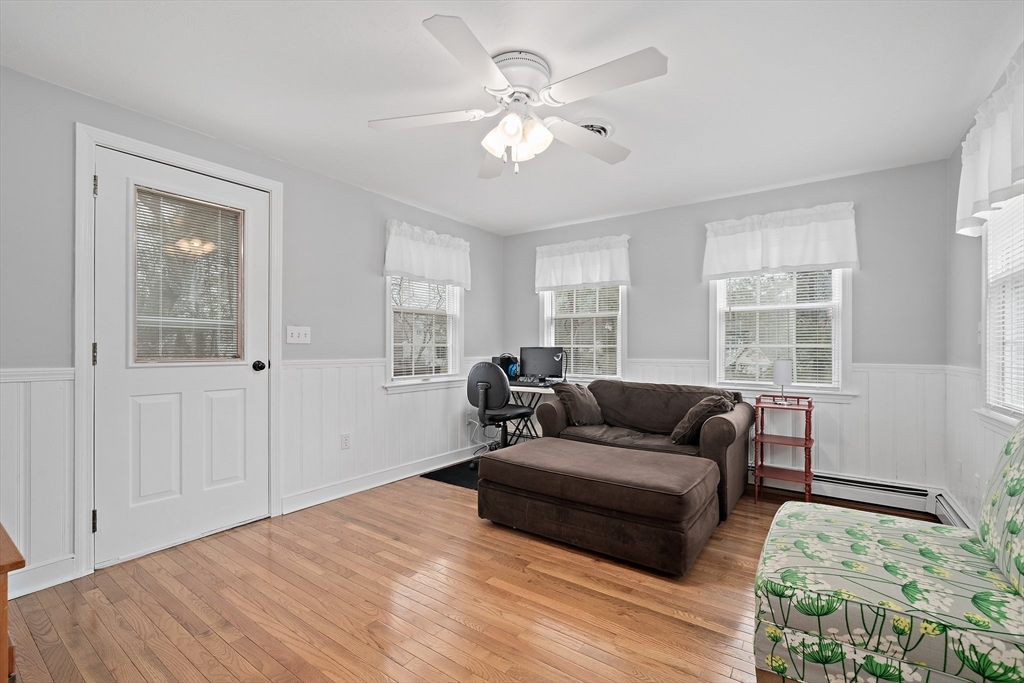 38 Roosevelt Street, Unit 2 Braintree, MA 02184 - Photo 11 of 17 a living room with furniture and windows