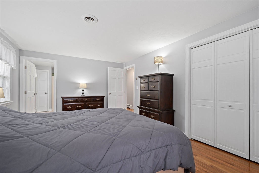 38 Roosevelt Street, Unit 2 Braintree, MA 02184 - Photo 14 of 17 a view of a bedroom with furniture and closet