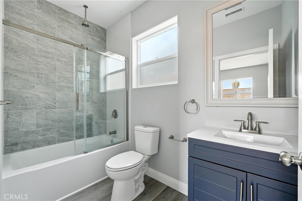 22022 Pioneer Boulevard Hawaiian Gardens, CA 90716 - Photo 20 of 50 a bathroom with a sink toilet and shower