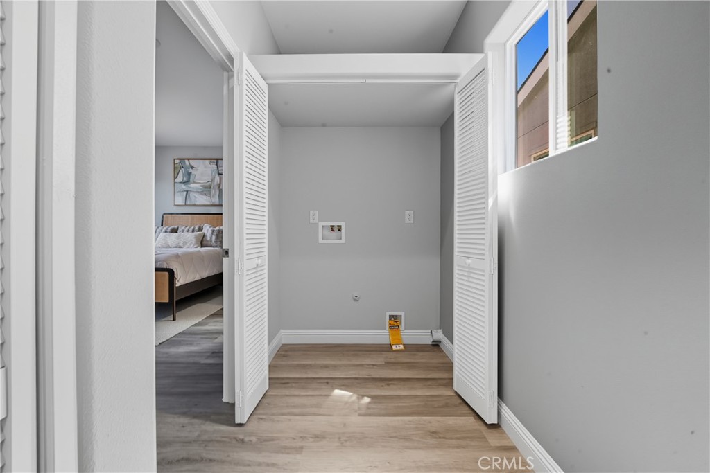 22022 Pioneer Boulevard Hawaiian Gardens, CA 90716 - Photo 26 of 50 a view of a hallway with wooden shelves