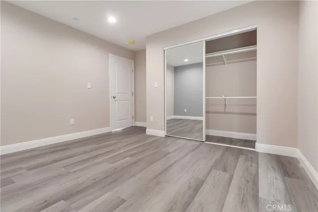 a front view of a house with parking space